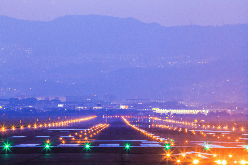 runway lights at sunset